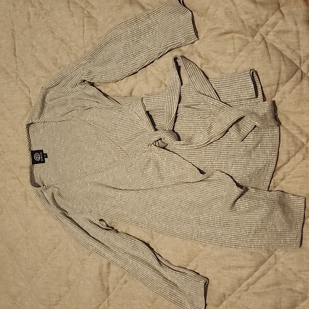 Criss cross grey striped long sleeve wrap light sweater or blouse.